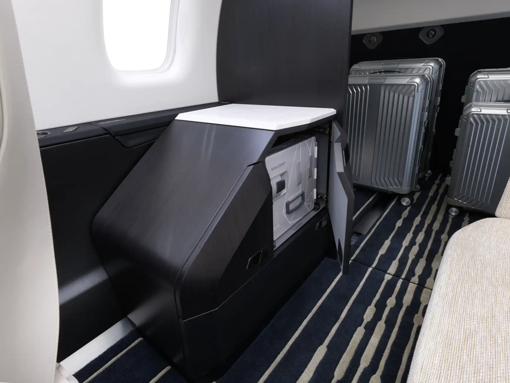 The PC-24 cabin shows storage space for equipment.