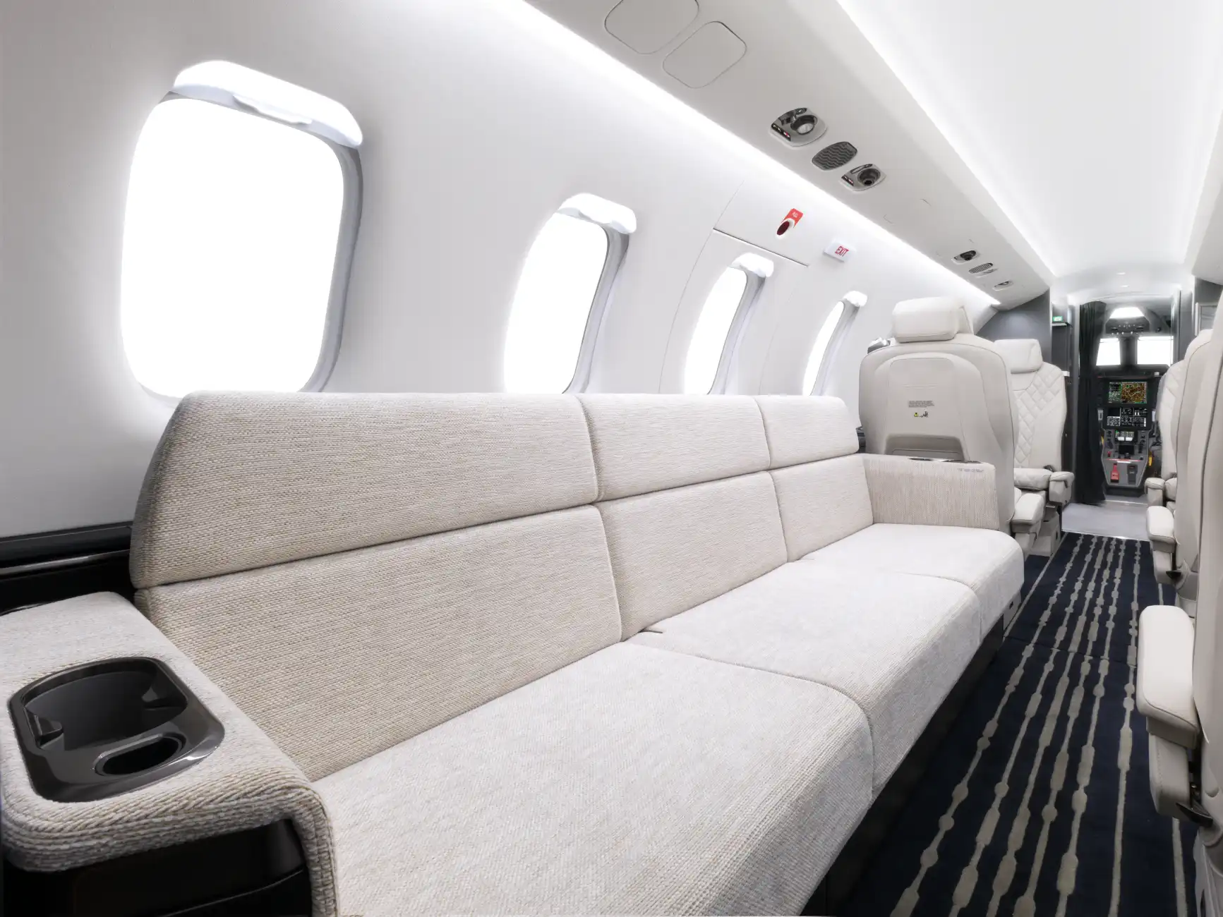 The PC-24 cabin shows the divan from the rear view of the aircraft
